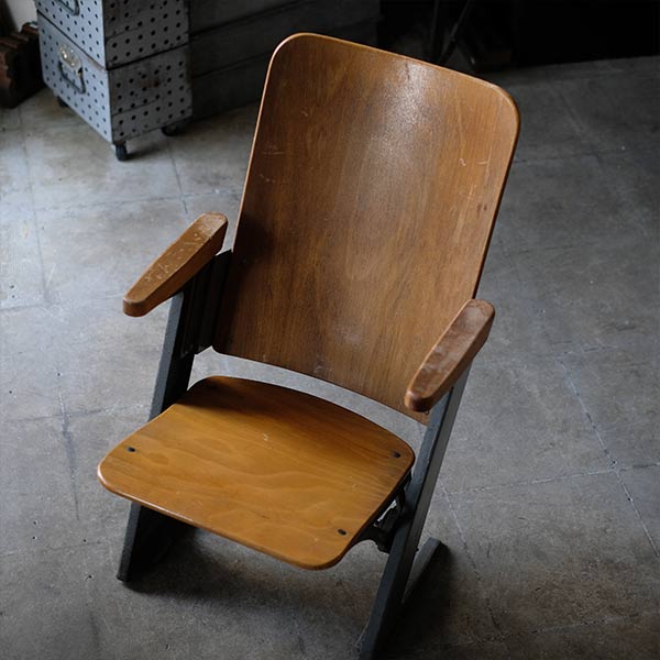 Compact theater chair