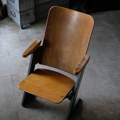Compact theater chair