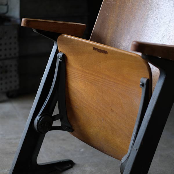 Compact theater chair