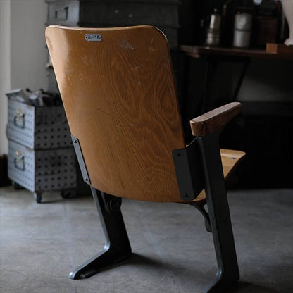 Compact theater chair