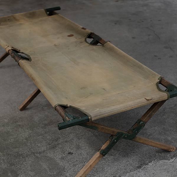A well-used American folding cot from 1944