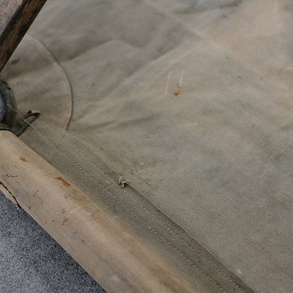 A well-used American folding cot from 1944