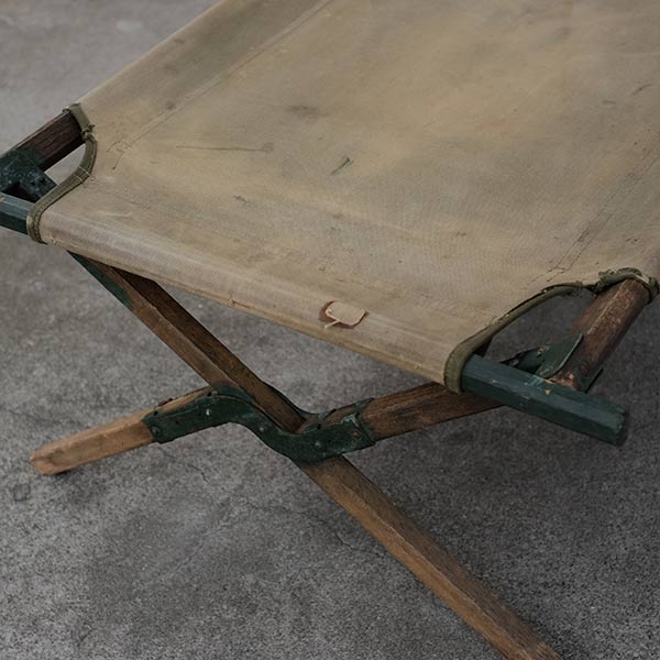 A well-used American folding cot from 1944