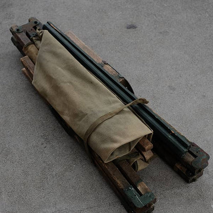 A well-used American folding cot from 1944