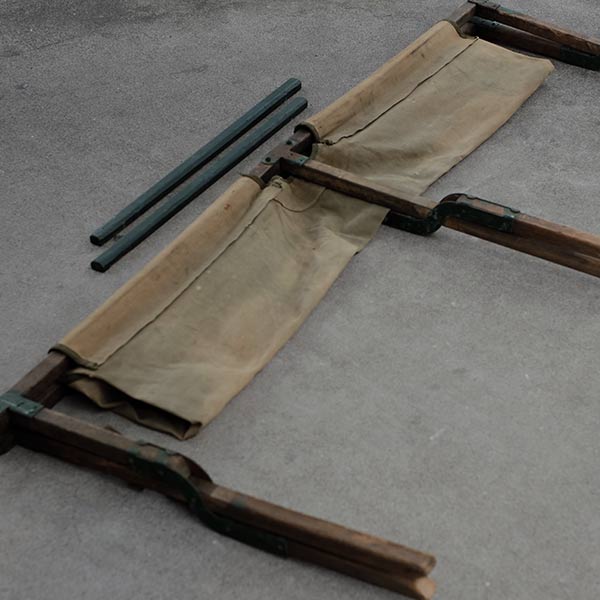 A well-used American folding cot from 1944