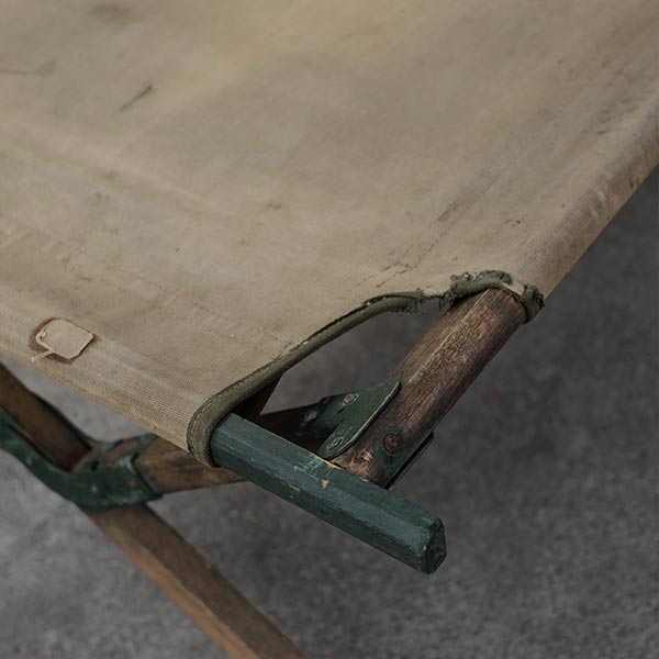 A well-used American folding cot from 1944