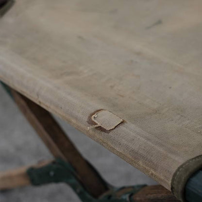 A well-used American folding cot from 1944