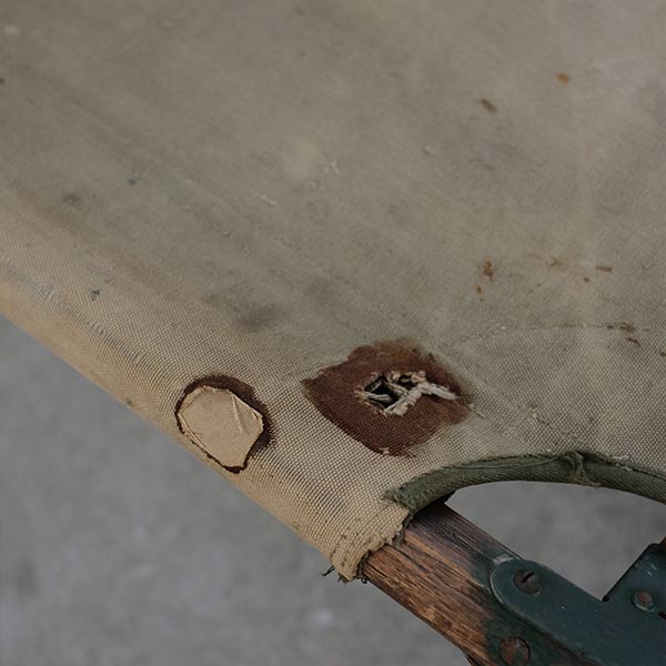 A well-used American folding cot from 1944