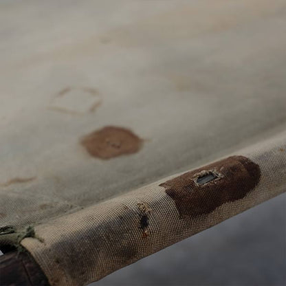 A well-used American folding cot from 1944