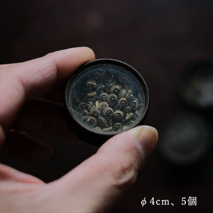 Cans and bottles containing watch parts (85 cans, 85 bottles)