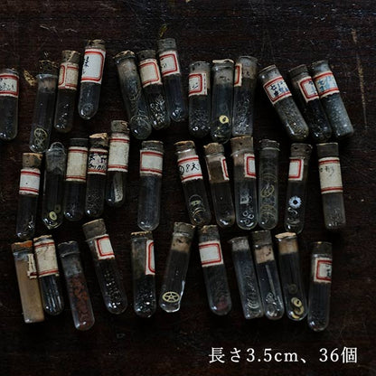Cans and bottles containing watch parts (85 cans, 85 bottles)