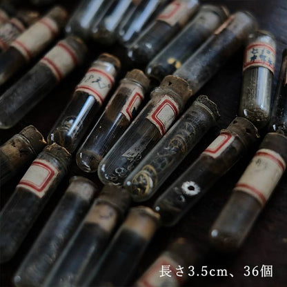 Cans and bottles containing watch parts (85 cans, 85 bottles)