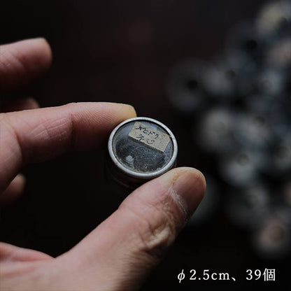 Cans and bottles containing watch parts (85 cans, 85 bottles)