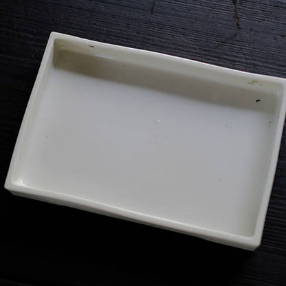 White porcelain water basin