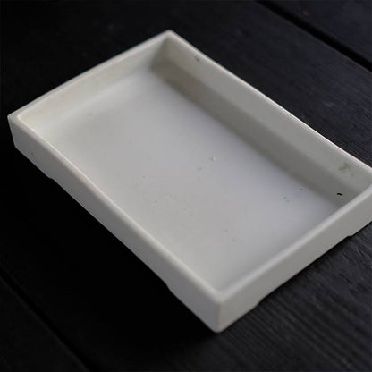 White porcelain water basin