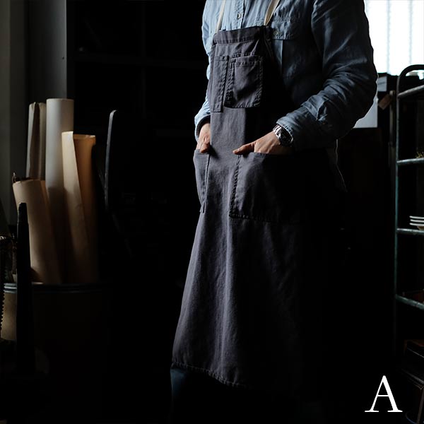 Faded navy blue work apron