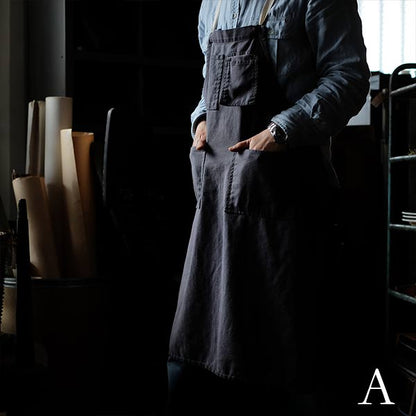 Faded navy blue work apron