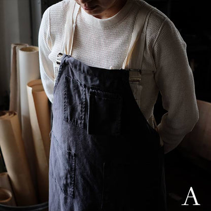 Faded navy blue work apron