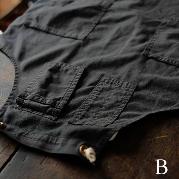 Faded navy blue work apron