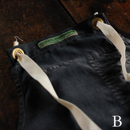 Faded navy blue work apron