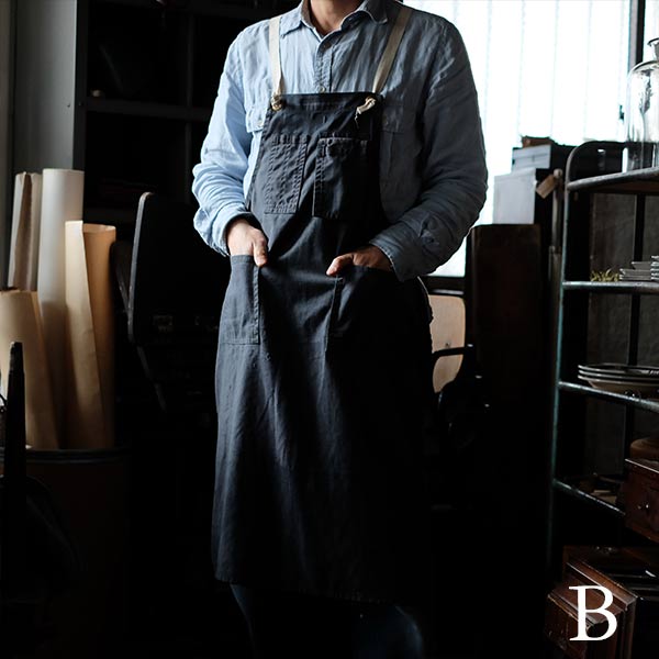 Faded navy blue work apron