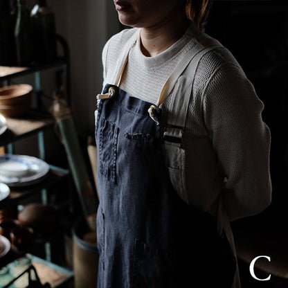 Faded navy blue work apron