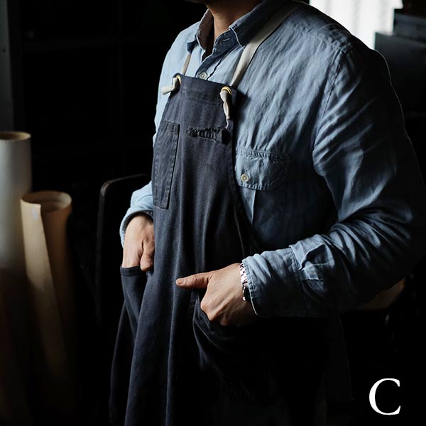 Faded navy blue work apron