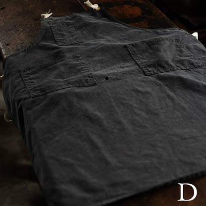 Faded navy blue work apron