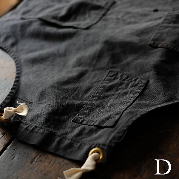 Faded navy blue work apron