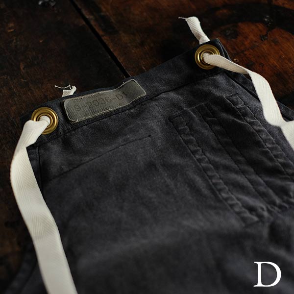 Faded navy blue work apron