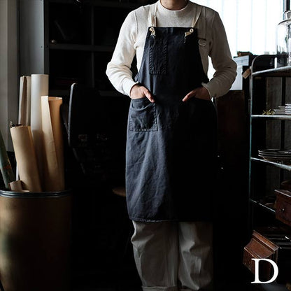 Faded navy blue work apron