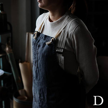 Faded navy blue work apron