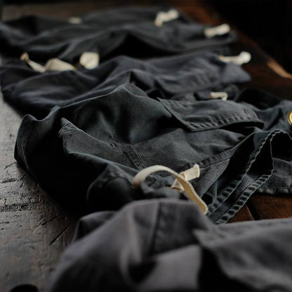 Faded navy blue work apron
