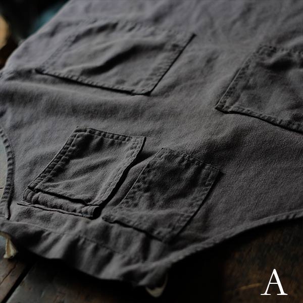 Faded navy blue work apron